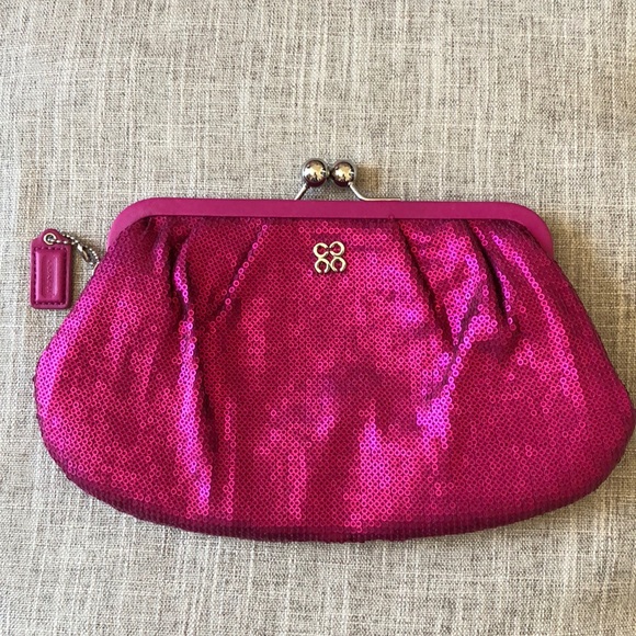 pink coach clutch